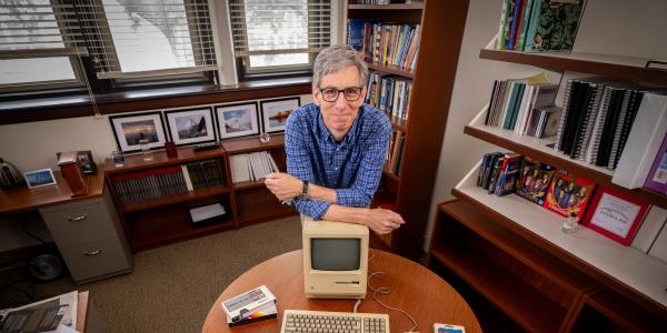 Peter Kastor with objects showcased in his Fall 2024 course 