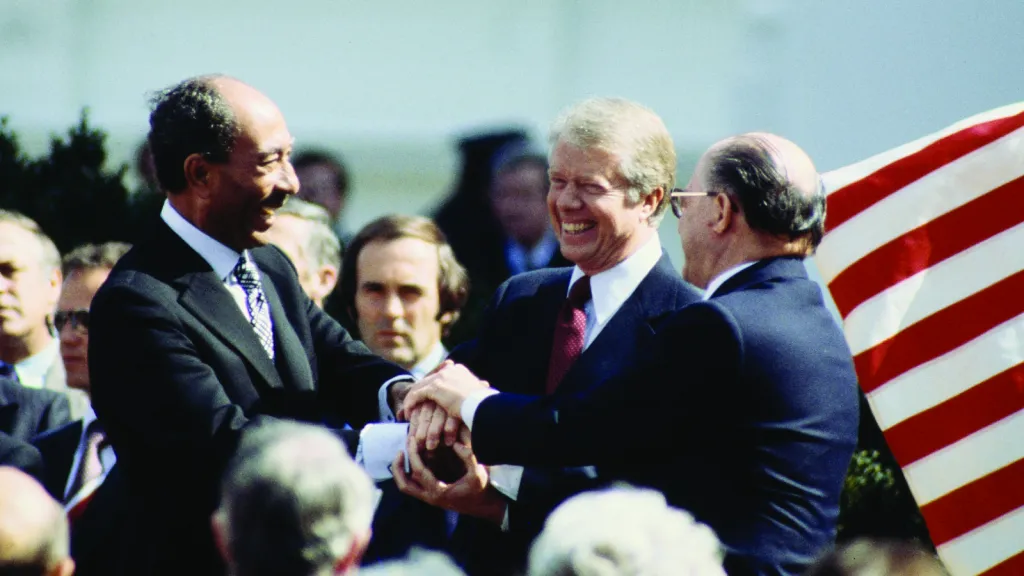 "U.S. President Jimmy Carter shakes hands with Egyptian President Anwar Sadat at the signing of the Egyptian-Israeli Peace Treaty at the White House on March 16, 1979. Source: Warren K. Leffler, Library of Congress"